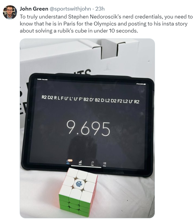 screen grab of twitter post From John Green about American gymnast Stephen Nedoroscik passing the time at the 2024 Olympics solving his Rubik's Cube in under 10 seconds. A previous Math Monday post talked about the history of the Rubik's Cube and its influence in math.